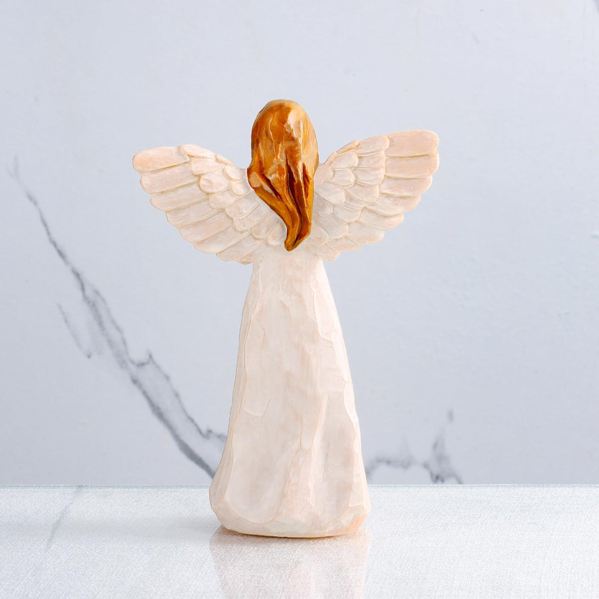 Kohehe hand-painted resin angel, intricate detailing for display.