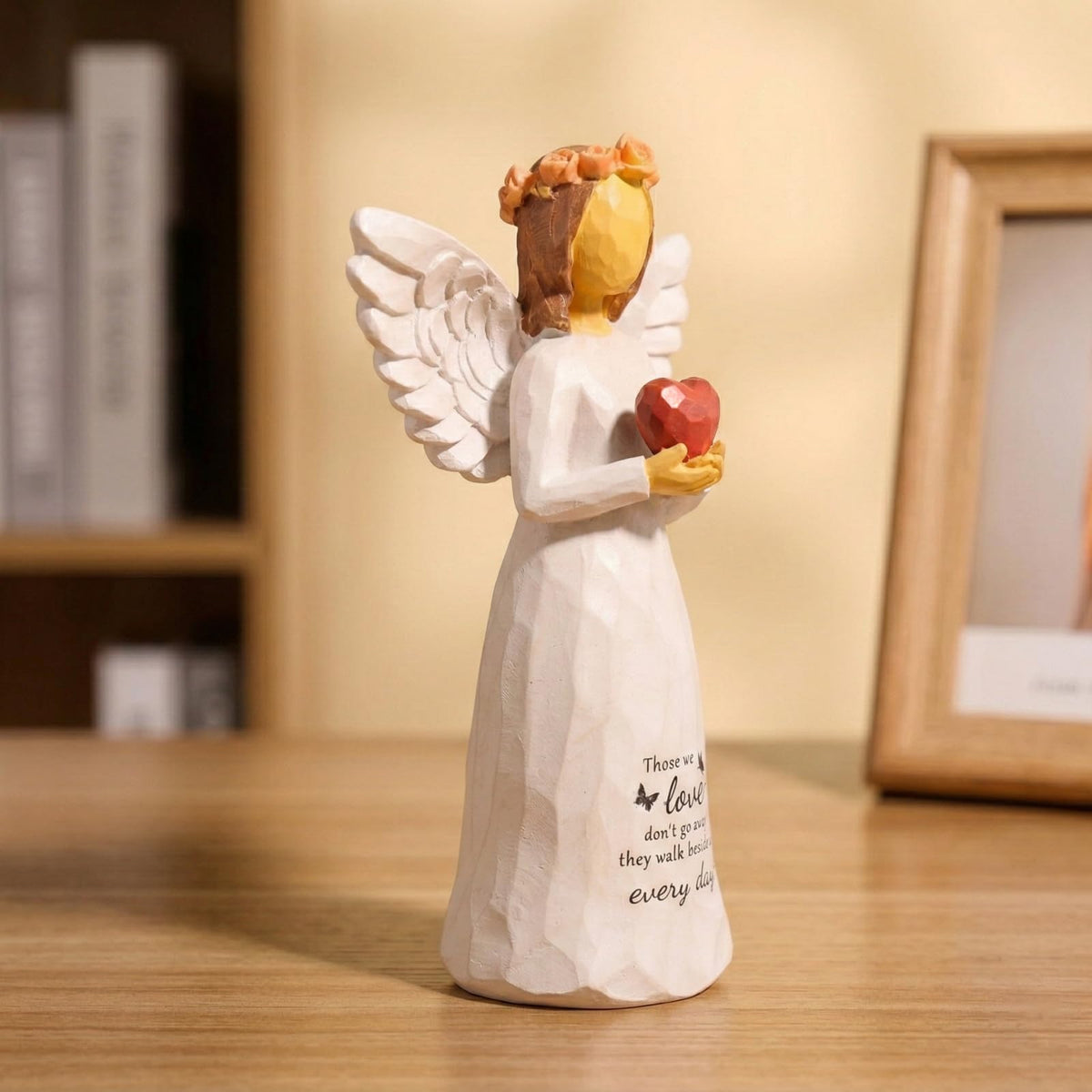 Kohehe handcrafted-resin-angel showcases textured wings and a warm, enduring presence.