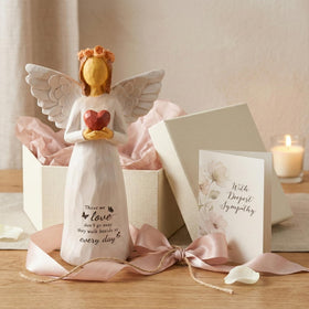 Kohehe matte-white-angel-statue complements shelves, mantels, and bedside memory displays.