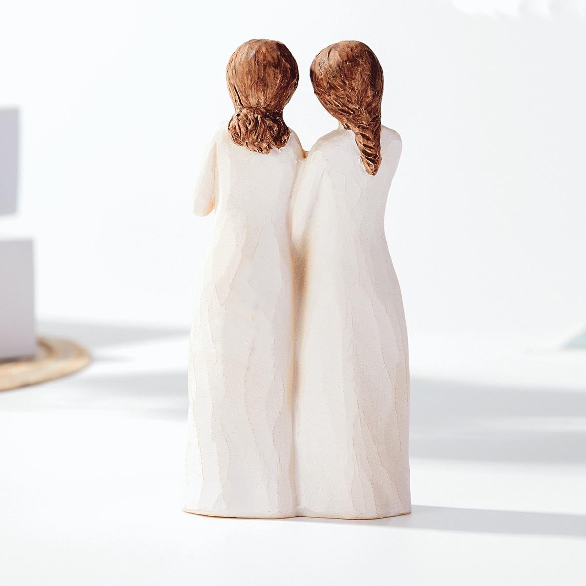 Kohehe sisters figurine detailed face showcasing craftsmanship
