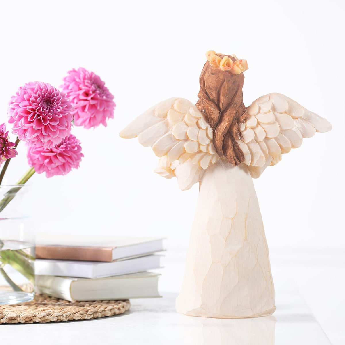 Kohehe angel with lifelike wings, intricate detailing for shelf decor