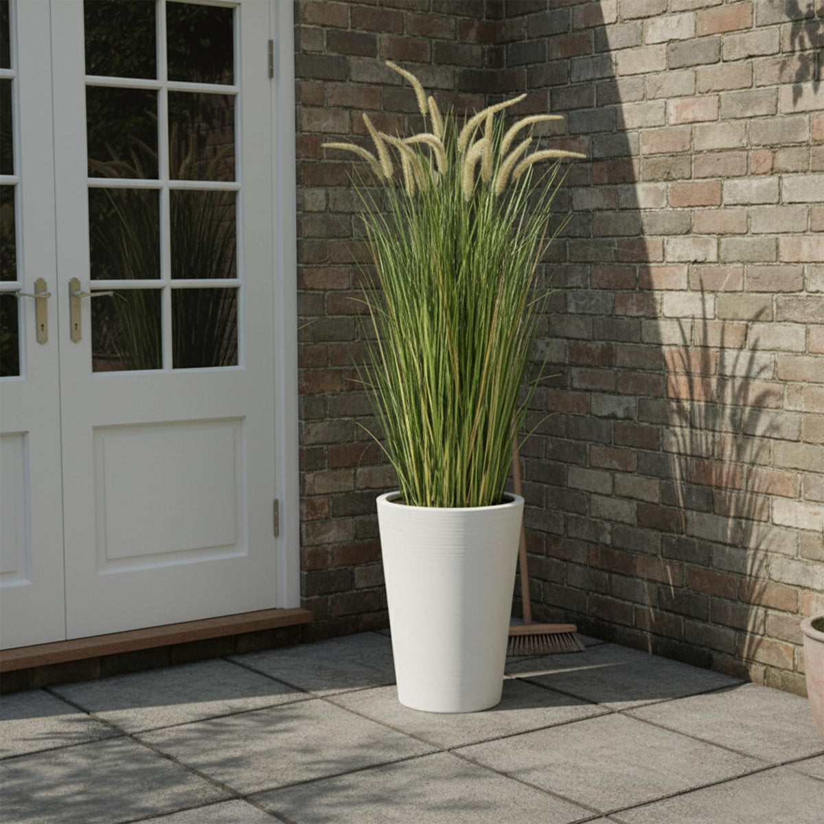 KOL included cement-base pot ensures stable support for tall plant.