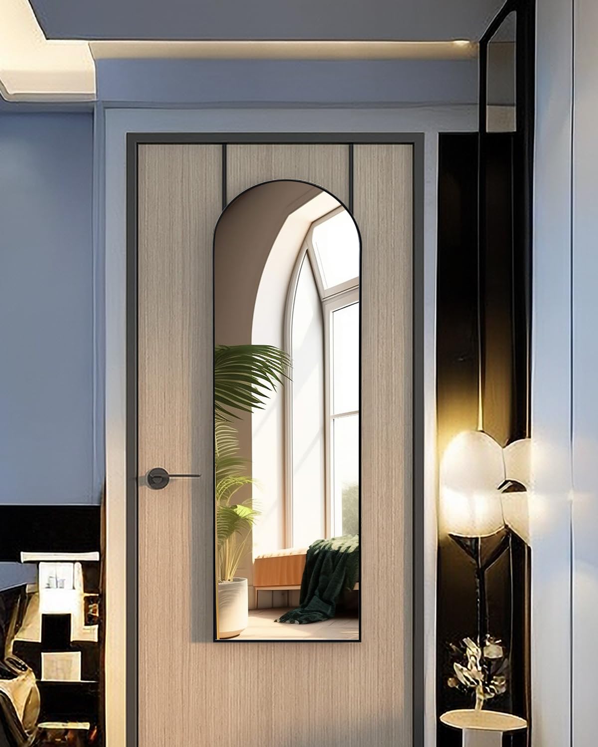 KOMCOTE arch full-length mirror enhances light and perceived space.