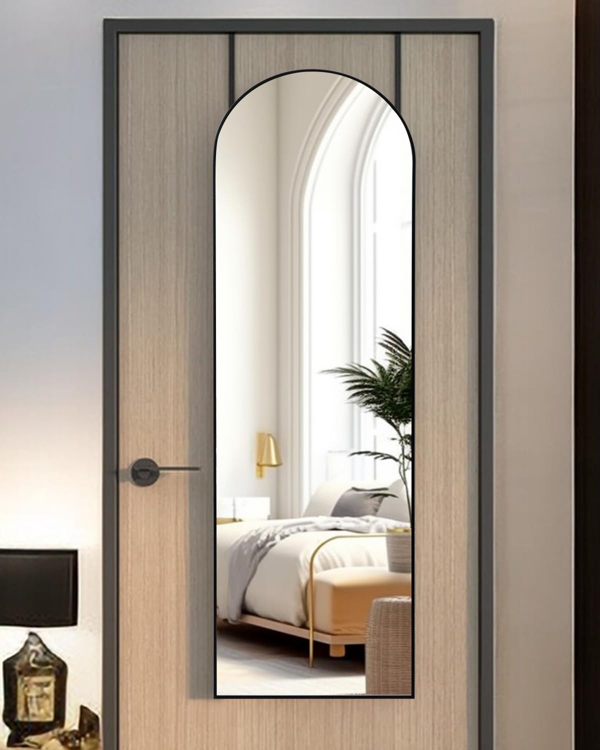 KOMCOTE over-door mirror with black frame adds style and saves floor space.