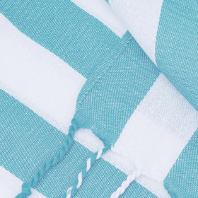 Kongdaoth Turkish towel used as shawl or blanket for lounging.