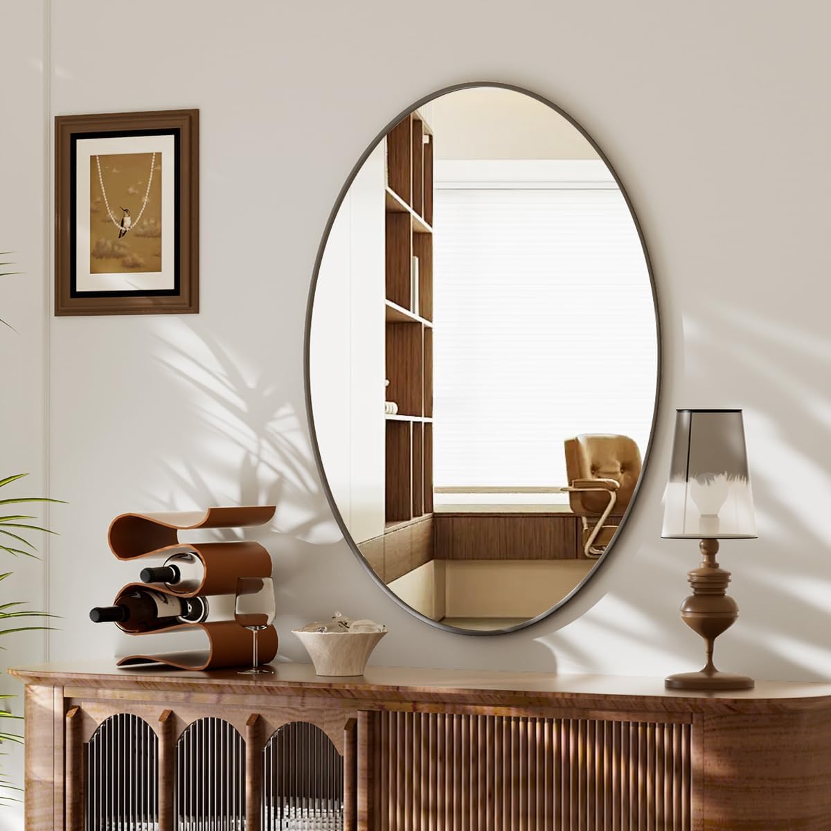 Koonmi oval mirror in living room entryway scene for bright, open feel