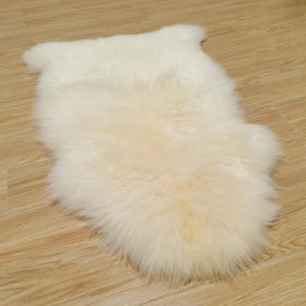 Kopal Australian sheepskin rug 2x3ft showcasing natural white plush warmth for cozy feet.