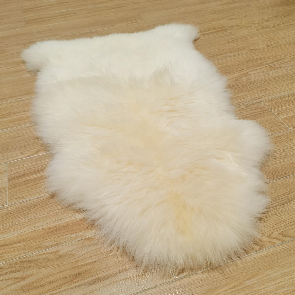 Kopal Australian sheepskin rug 2x3ft showcasing natural white plush warmth for cozy feet.