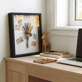 Kormuge memory display with polystyrene glass protects cherished items.