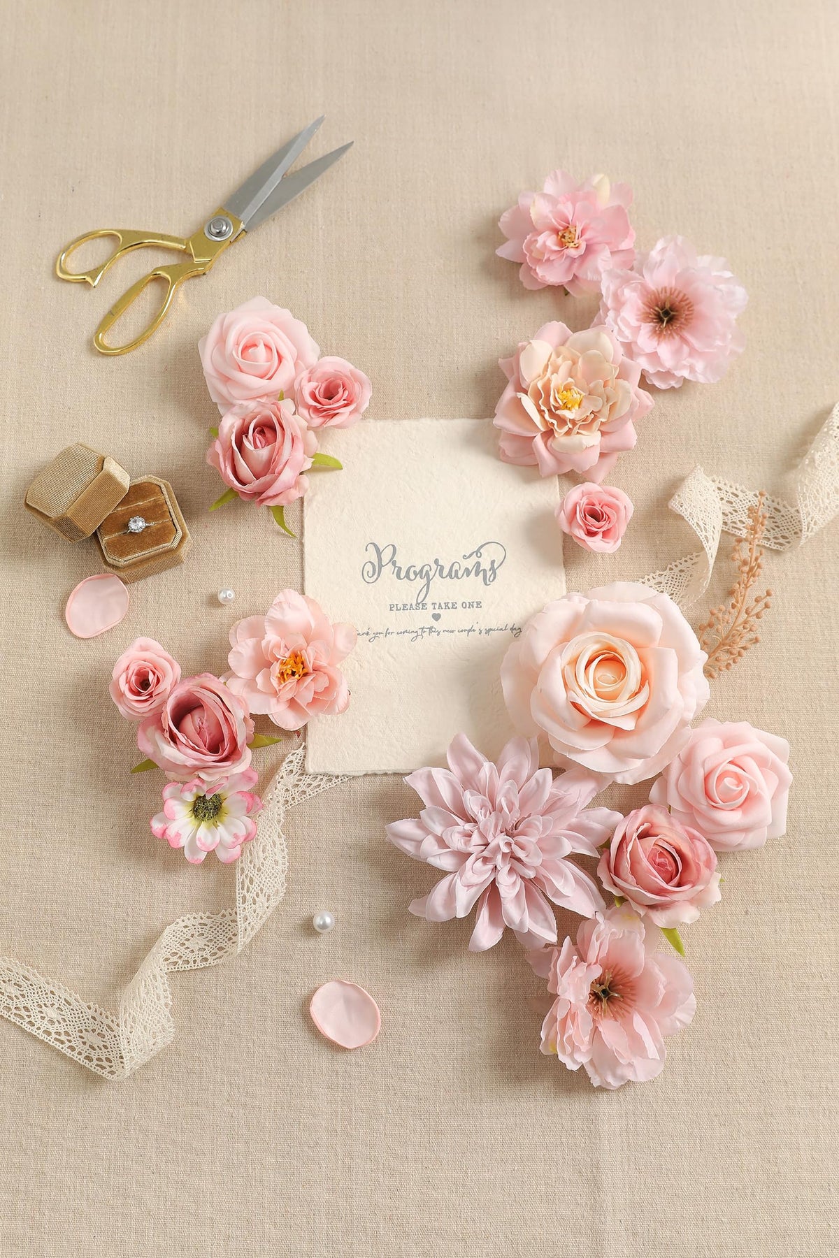 Koroni Flowers wedding centerpieces setup with versatile pink blooms.