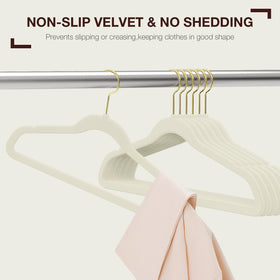 Korpai slim-profile beige velvet hangers save space while maintaining garment shape.