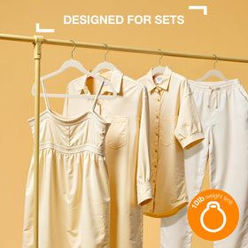 Korpai two-in-one hangers help coordinate tops and bottoms on one hanger.
