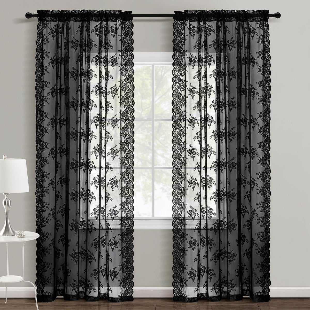 Kotile bedroom setup showing black lace curtains with privacy and style.