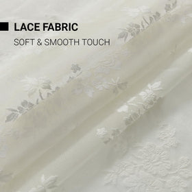 Kotile ivory lace curtains creating a warm living room ambiance