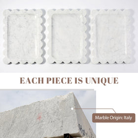 Koville marble tray used as a jewelry and perfume organizer on a dresser.