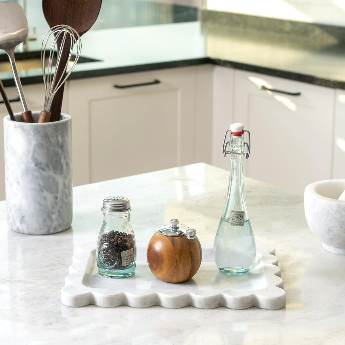 Koville marble tray on the kitchen counter for organized essentials.