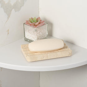 Koville stone soap tray for candles or essential oils adds calm ambiance.