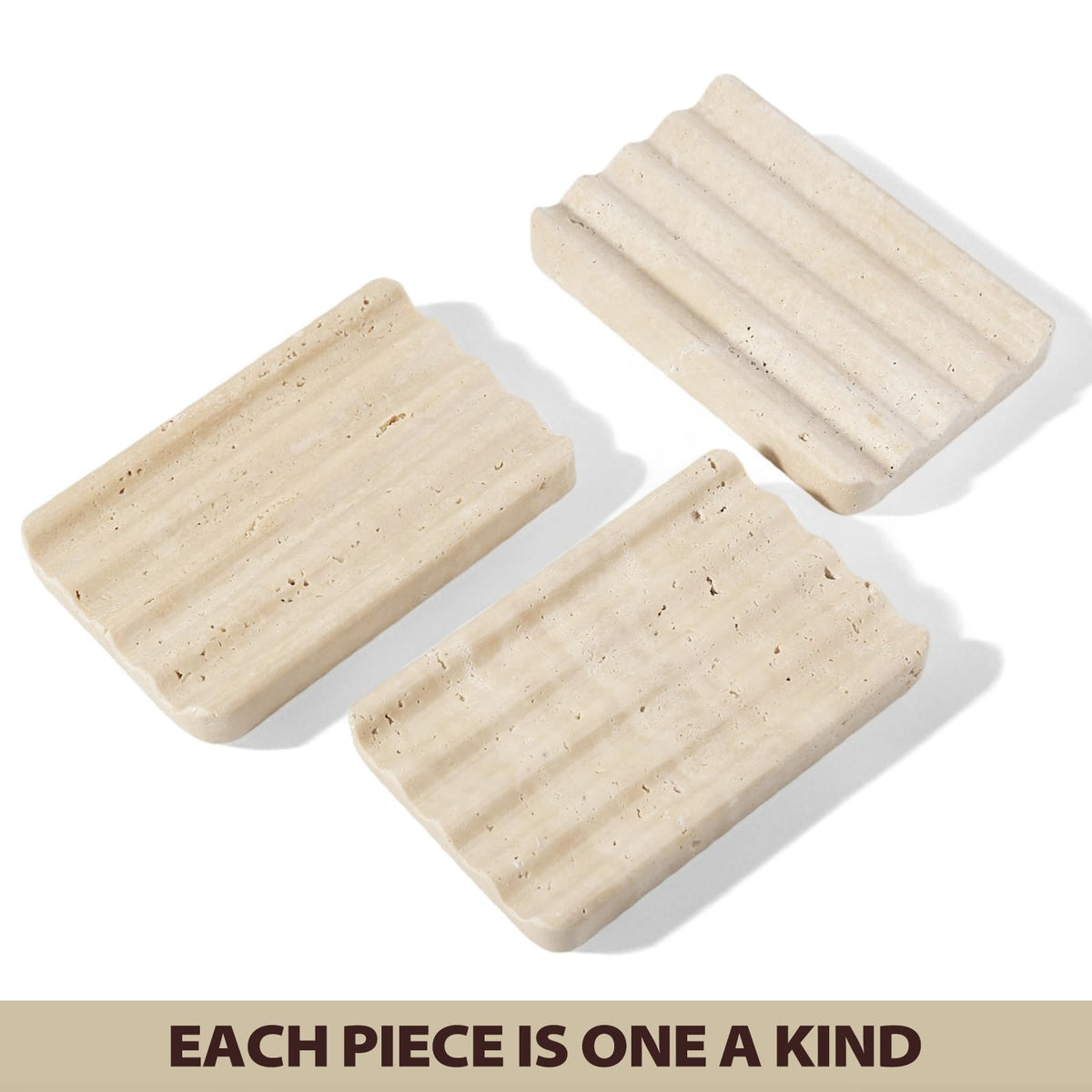 Koville travertine dish at bedside supports jewelry and small essentials.
