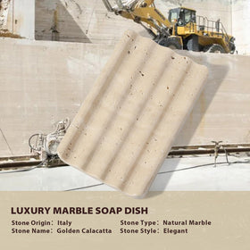 Koville travertine dish with porous drainage handles excess water gracefully.