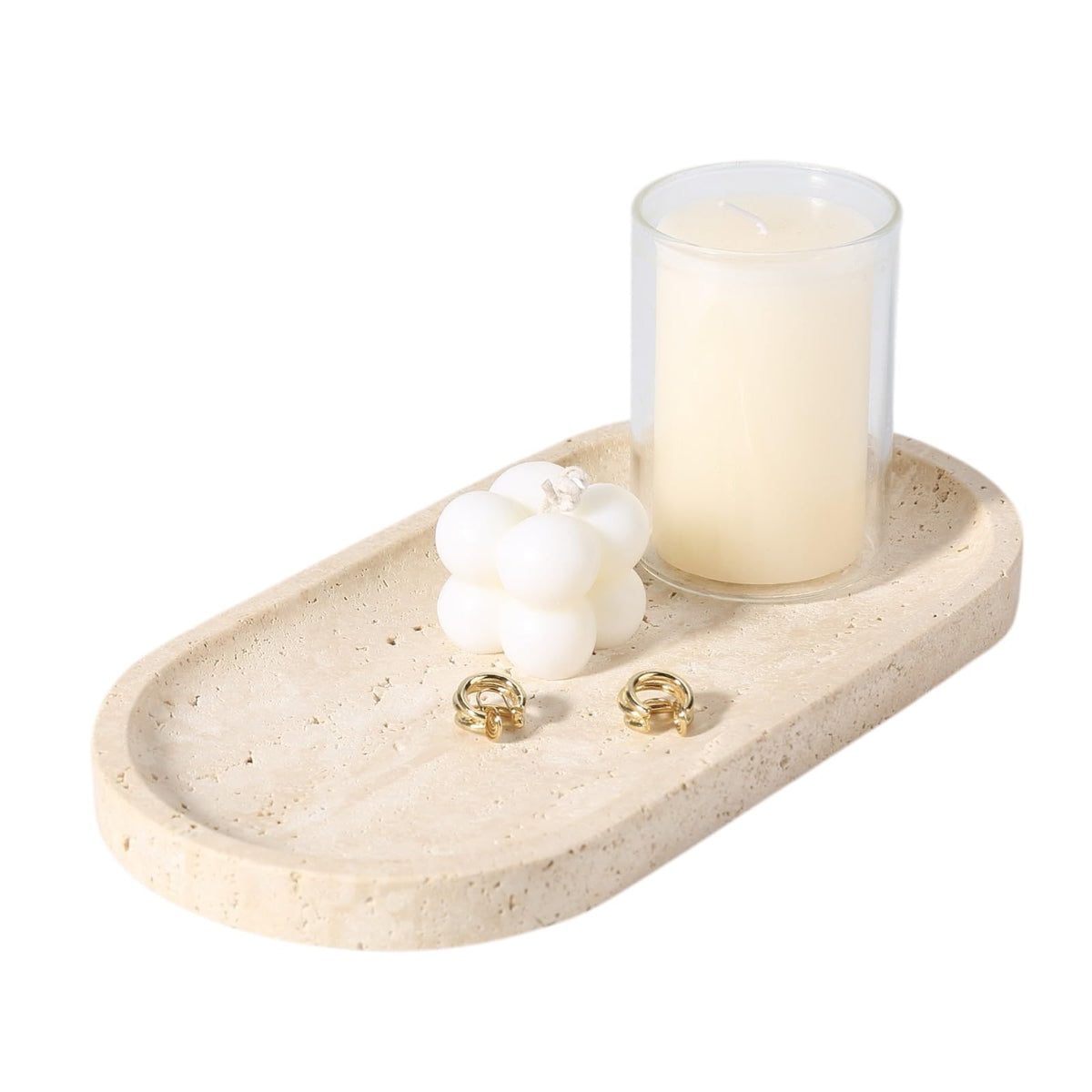 Koville travertine tray on bathroom counter keeps perfume and cosmetics organized