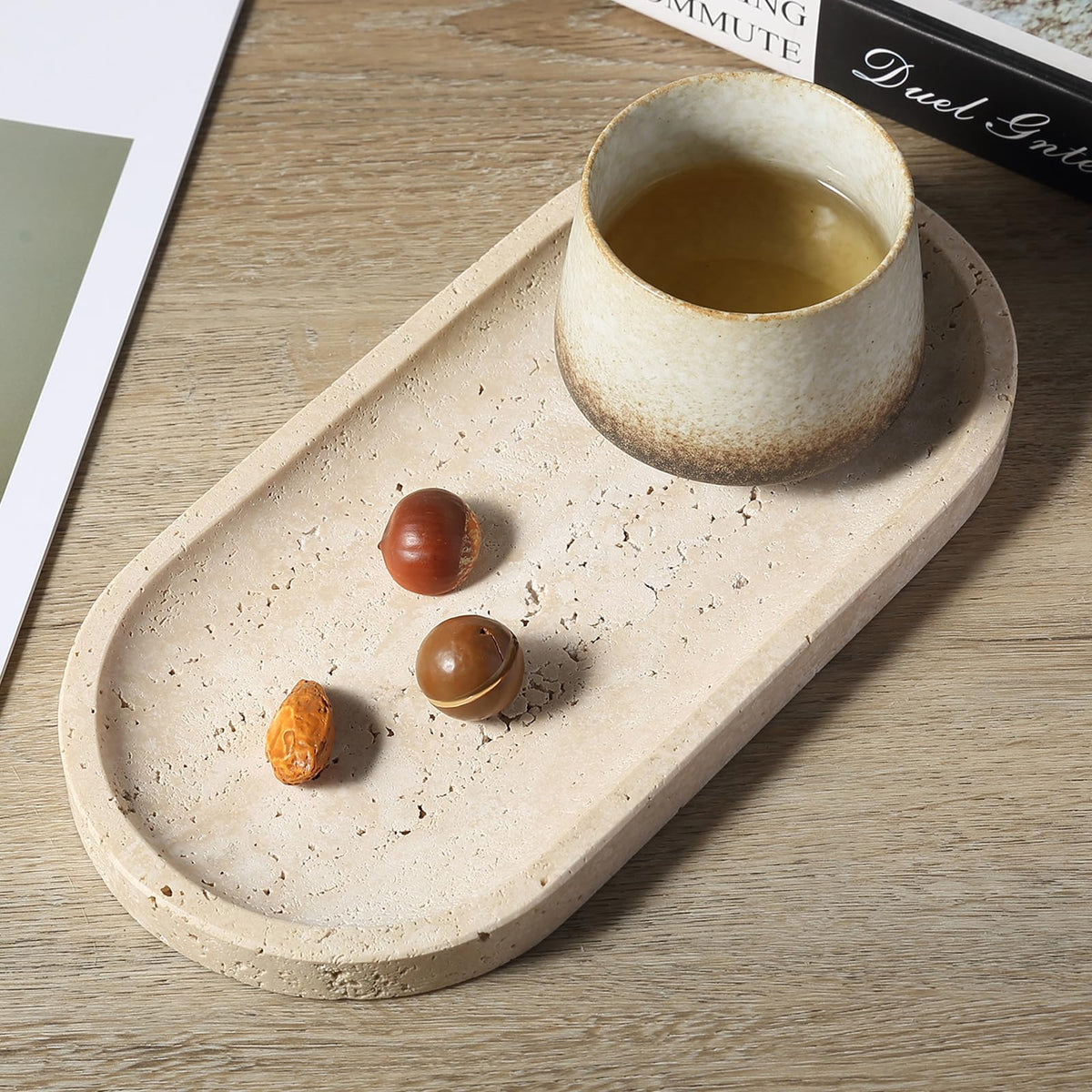 Koville travertine tray supports candles and small decor safely
