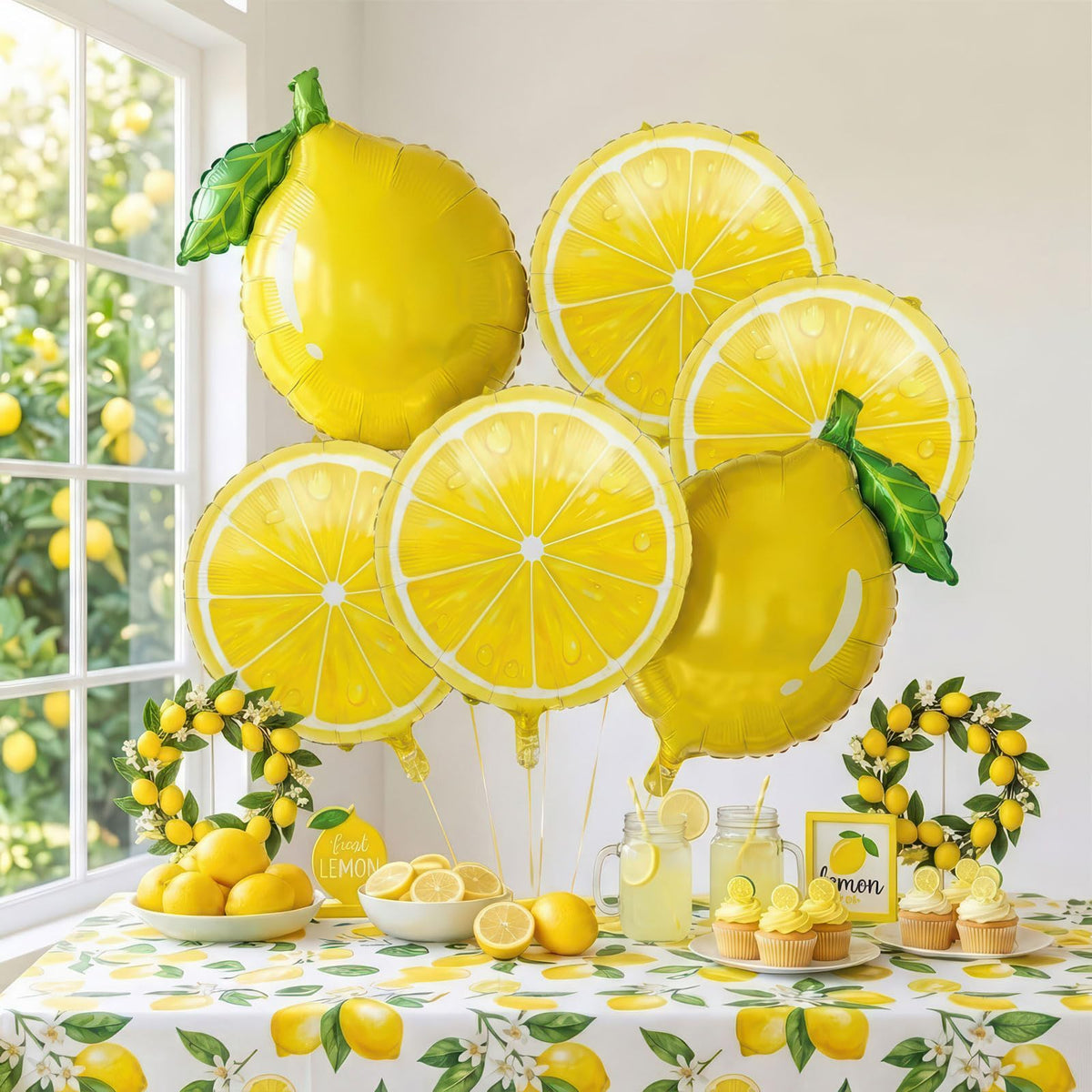 Kozee Main Squeeze oval lemon balloon with leaves creates a vibrant summer backdrop.