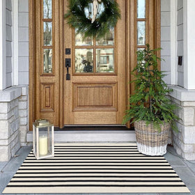 KOZYFLY black and beige striped porch rug ideal for front doors with durable foot traffic protection.