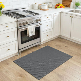 KOZYFLY mat with non-slip rubber backing for stable placement on floors