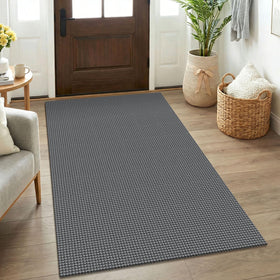 KOZYFLY entryway rug with grey braided texture and non-slip backing for safety.