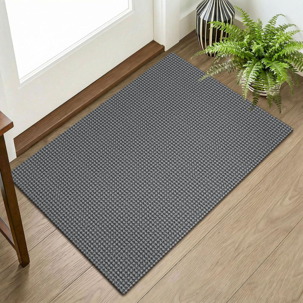 KOZYFLY indoor door mat front view showcasing subtle gray braided texture for entryways