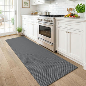 KOZYFLY non-slip rubber backing close-up enhances stability on smooth floors.