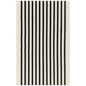 KOZYFLY welcoming striped rug creates a warm atmosphere on the front porch.