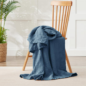 Kozyhvn cotton muslin blanket bedspread in calming blue.