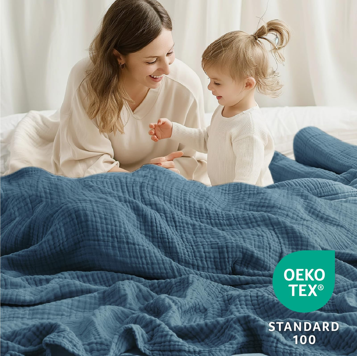 Kozyhvn lightweight co-sleep friendly blanket for families.