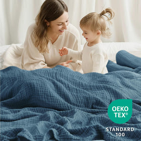 Kozyhvn lightweight co-sleep friendly blanket for families.