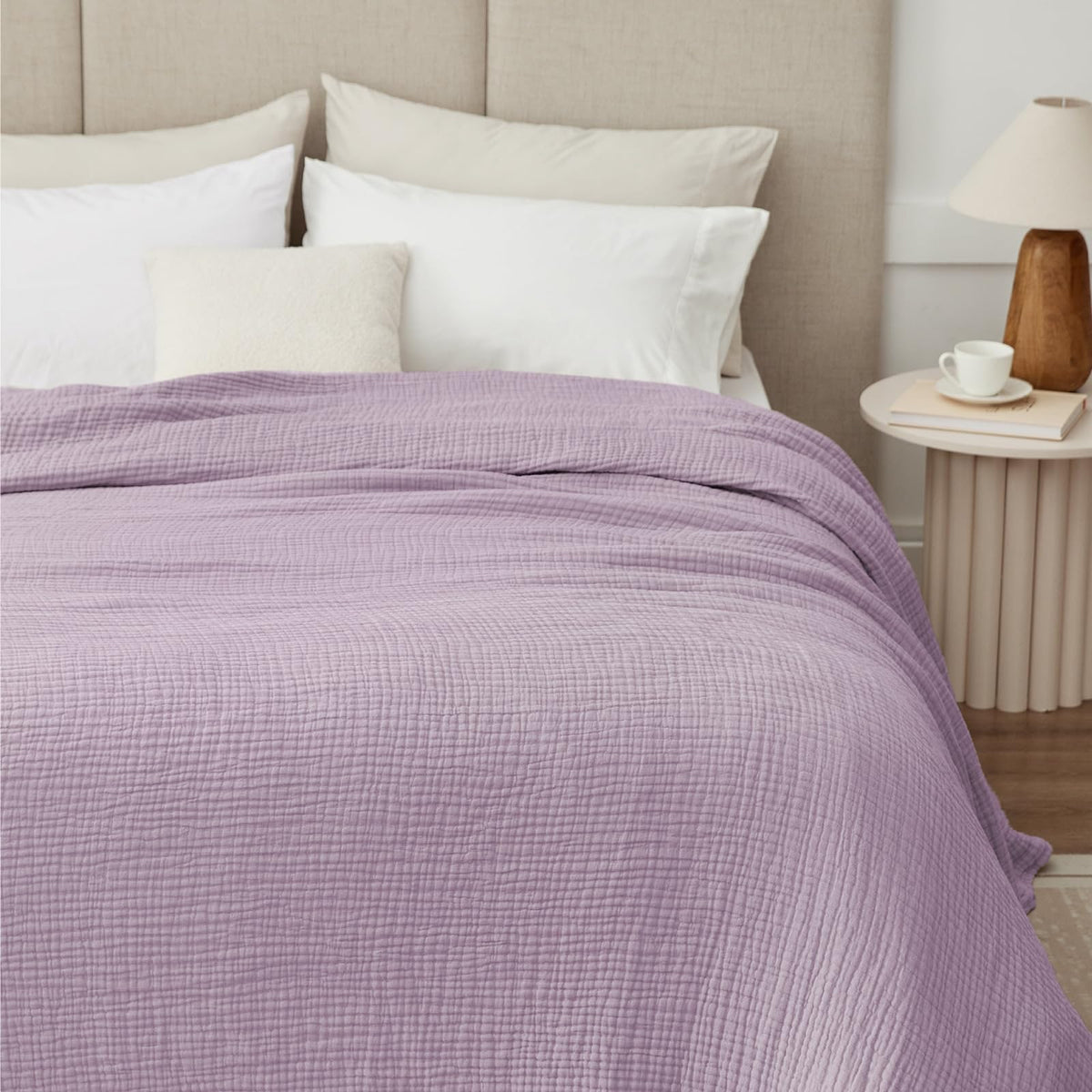 Kozyhvn muslin blanket closeup weave, highlighting soft texture and coziness.
