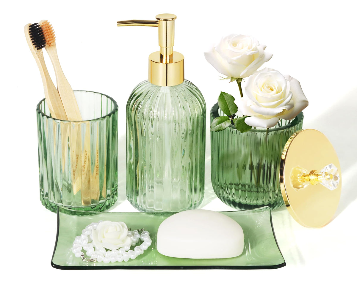 Kukikan designer green glass dispenser enhances bathroom organization.