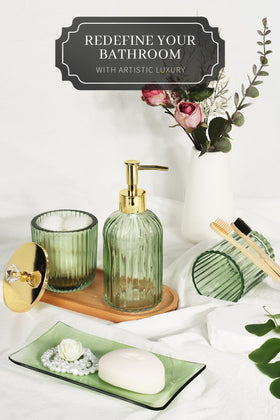 Kukikan designer green glass toothbrush holder keeps counters tidy.