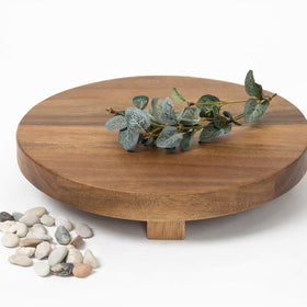 Kurrajong Farmhouse footed wooden tray showcases a round acacia surface for stylish plant displays.