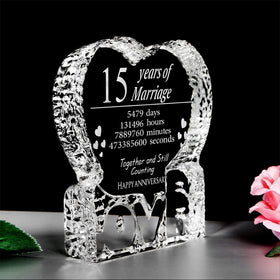 KWOOD heart crystal engraving inside detail highlights precise laser art.