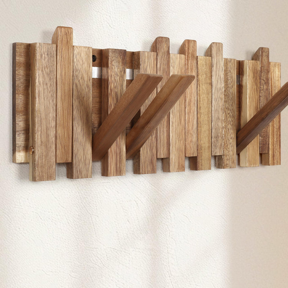 KYIAANY wall coat rack with flip-up hooks keeps entryways tidy.