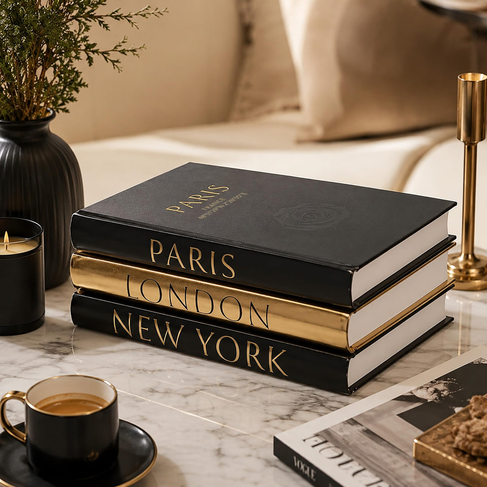 L’AMOUR HOME DECOR decorative books on coffee table add a luxurious focal point.