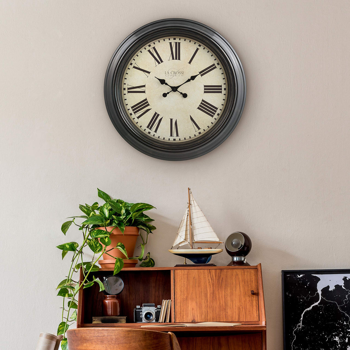La Crosse Maxwell 23in clock in a living room demonstrates commanding decor presence.
