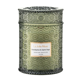 LA JOLIE MUSE daisy-embossed jar enhances décor while inviting aroma