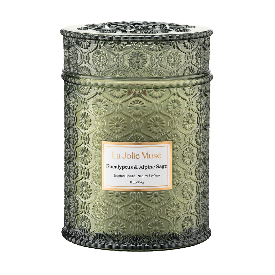 LA JOLIE MUSE daisy-embossed jar enhances décor while inviting aroma