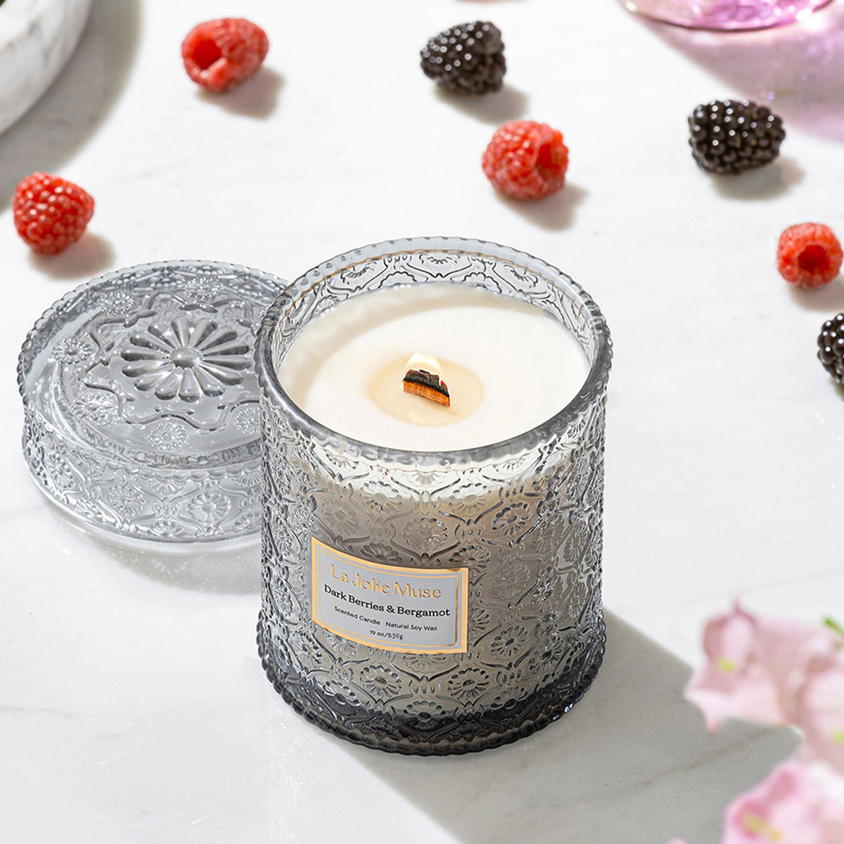 La Jolie Muse jar with embossed daisy adds refined decor touch