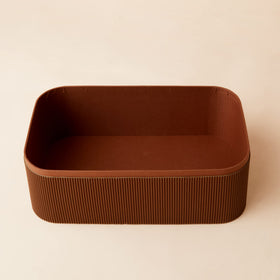 Closeup of leather-like lid on LA JOLIE MUSE basket