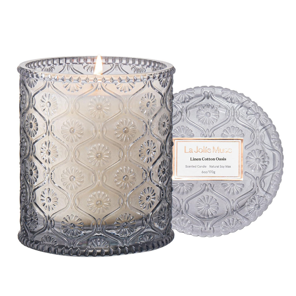 LA JOLIE MUSE Linen Cotton Oasis candle jar enhances refined decor and clean fragrance.