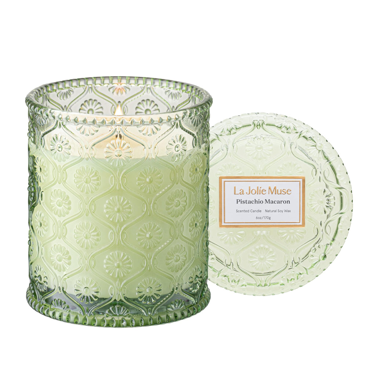 LA JOLIE MUSE Pistachio Macaron candle jar with daisy embossing for elegant home decor.
