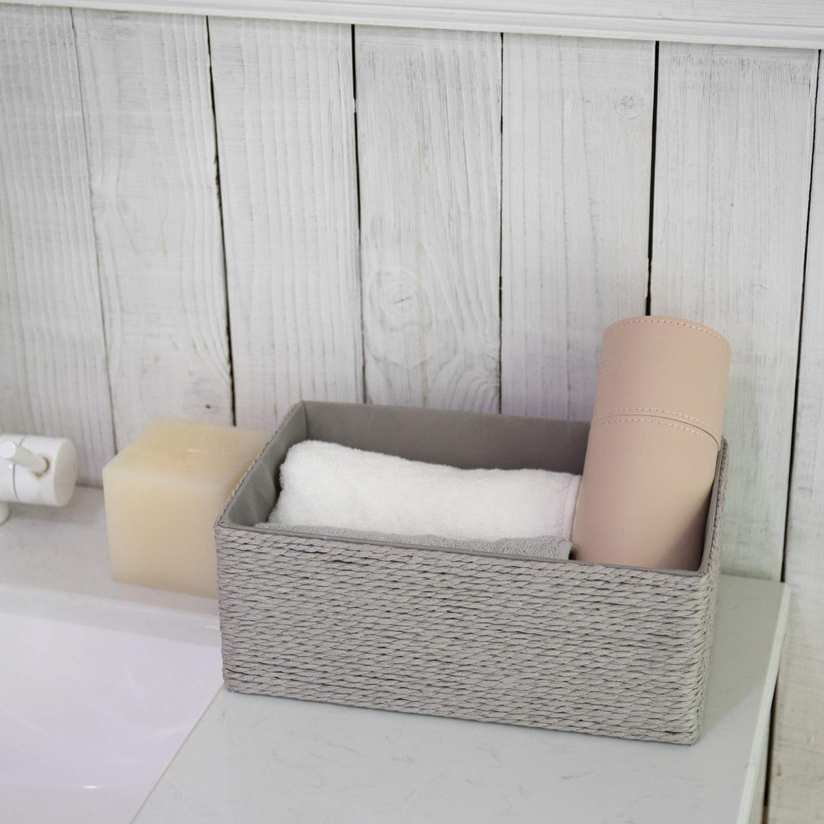 La Jolie Muse gray storage boxes blend with modern decor and reduce clutter.
